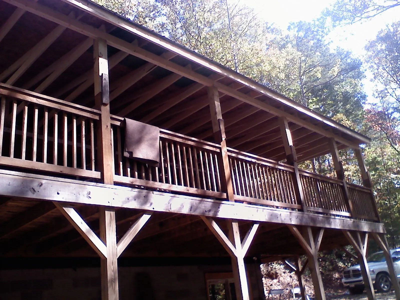 Timber framing under a new elevated porch and deck — Roof Leak Repair in Fossil by Roofing Brothers